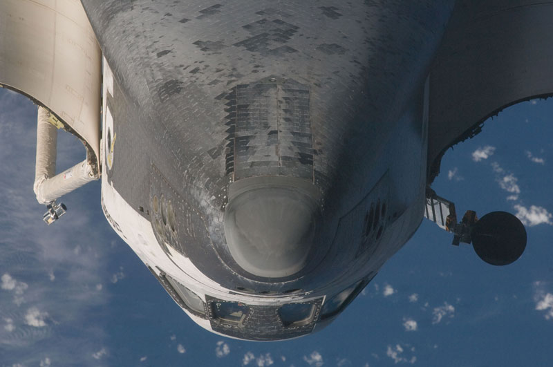 Astronauts Scan Space Shuttle Heat Shield For Dings